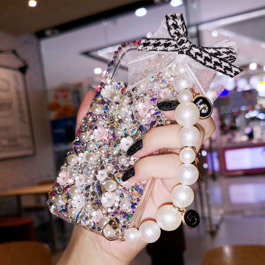 Handgefertigte iPhone-Hülle mit luxuriösen Bling-Strasssteinen und Perlen und Charm-Kette
