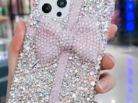 Funda hecha a mano para iPhone de lujo con pedrería brillante y bonito lazo trasero